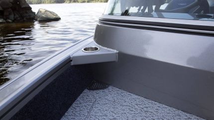 Cup holder and bow drain